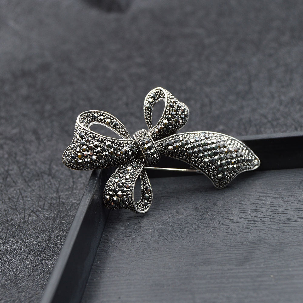 Rhinestone bow brooch on sale
